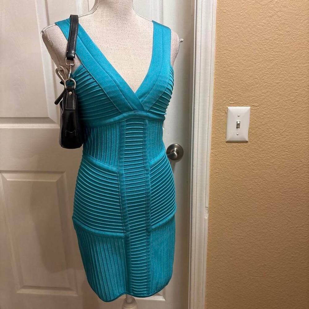 Bebe blue bandage style mini dress. Size small